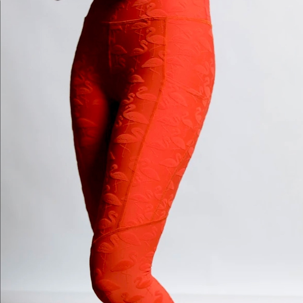 Orange flamingo 3D gym tights from Twenty Montreal size M